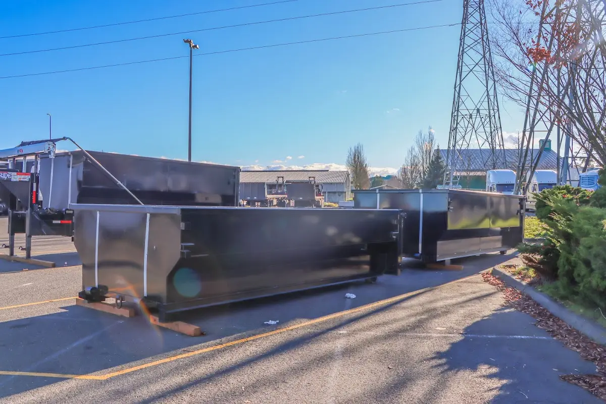 Roll-off dumpster ready for waste disposal at job site for 12 Yard Dumpster Rental in Rossford